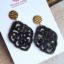 Bild von  Ornament-Ohrstecker - Rhombusform aus Resin black - Stecker goldfarbig